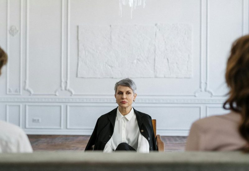 Photo of a couple in counseling. Learn the signs that your marriage is in trouble and get help now.